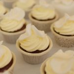 Delicious cupcakes with creamy vanilla frosting, perfect for weddings or celebrations.
